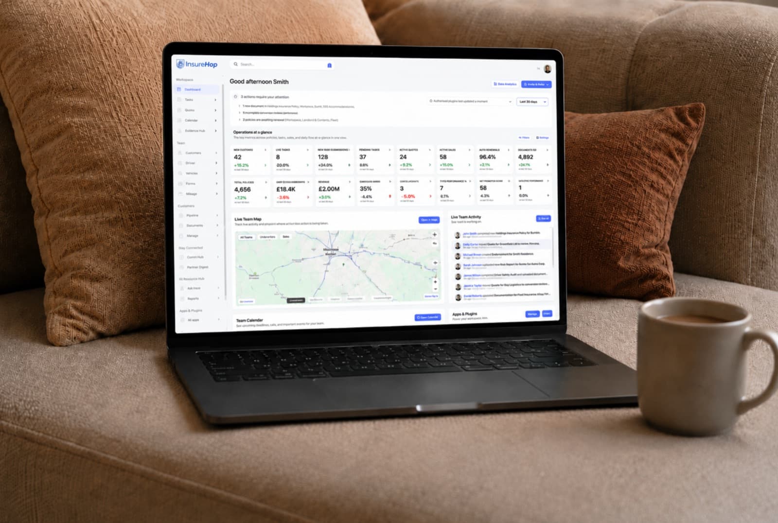 InsureHop operations dashboard on a laptop