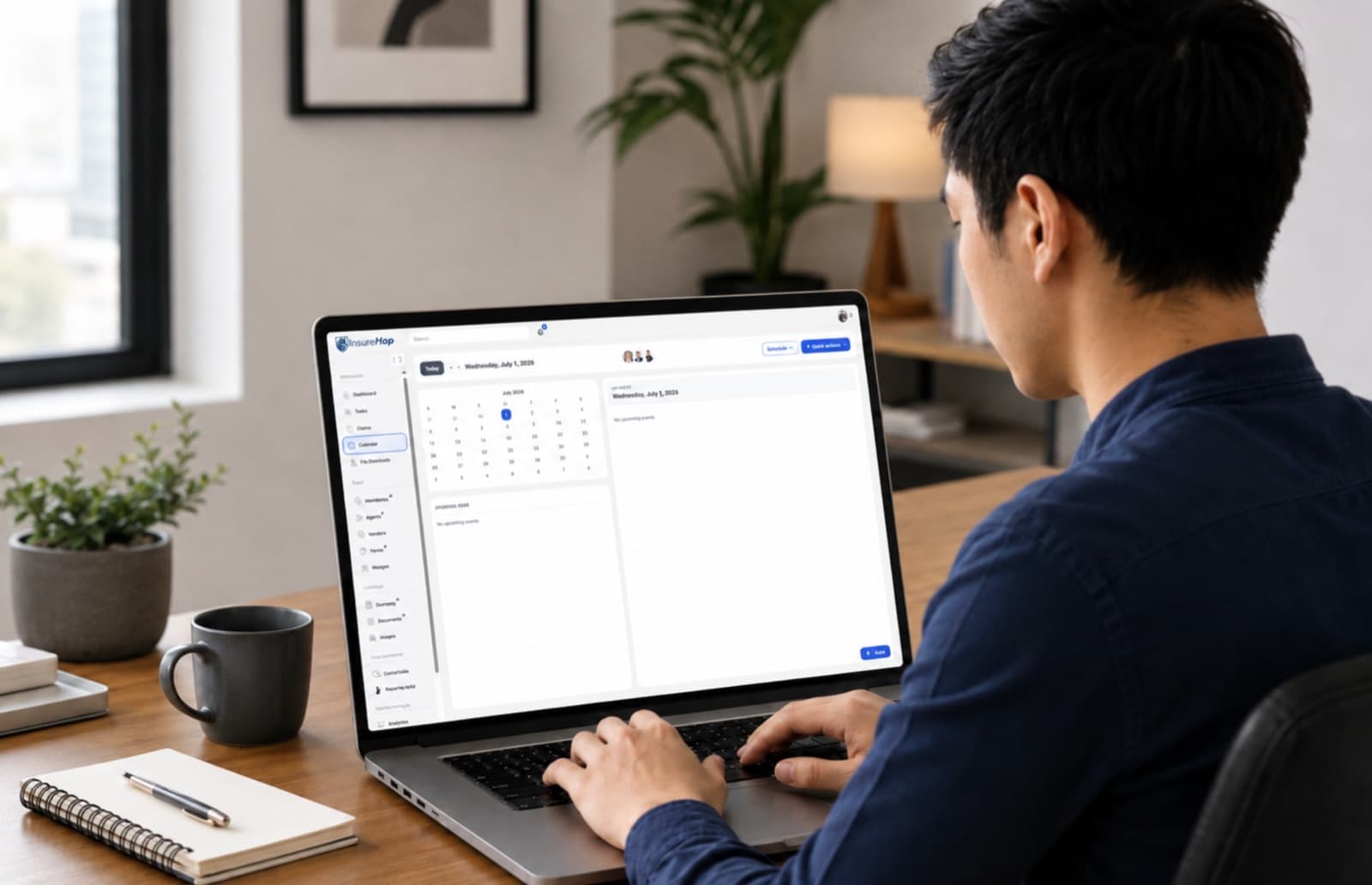 Operations director using InsureHop on a laptop